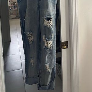 Distressed denim overall